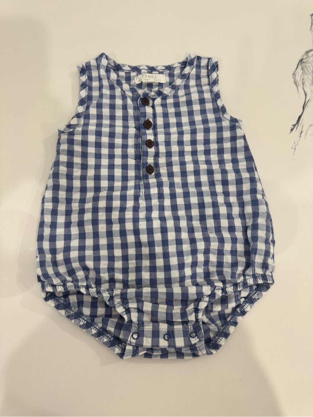 KENDI by Colored Organics Organic Baby Wren Seersucker Bubble Romper in Marino